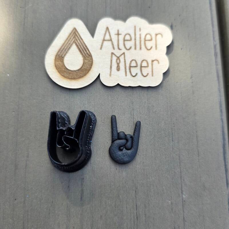 Rockhand uitsteekvormen ~ Graspop Metal Meeting kleicutters
